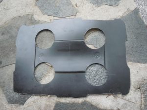 use heavy scissors to cut the lid to fit inside and cut four holes 1 1/2" from the edge